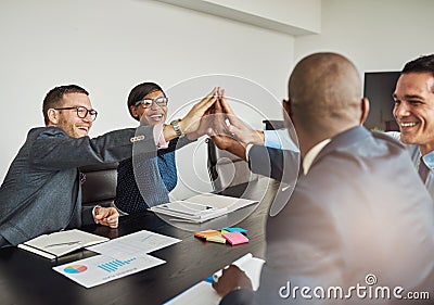 Jubilant multiracial business team cheering Stock Photo