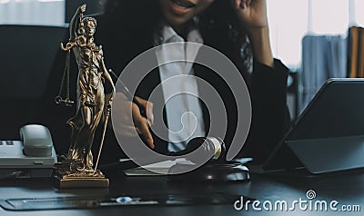 Judge gavel with Justice lawyers having team meeting at law firm background. Concepts of Law and Legal services Stock Photo