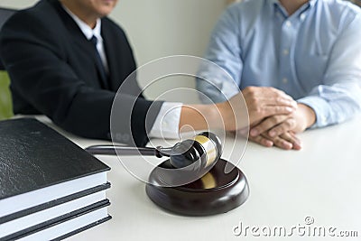 Judge gavel with Justice lawyers Plaintiff or defendant meeting Stock Photo