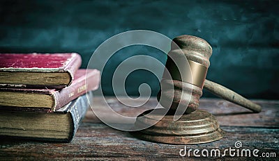 Judge gavel, old books and reading glasses on a wooden table, black board background. 3d illustration Cartoon Illustration