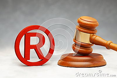 Judge gavel and red wood trademark sign Stock Photo