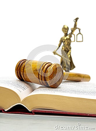 Judge hammer, the book of laws and justice statue. Stock Photo