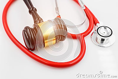 Judge hammer with stethoscope for doctor medical profession relate with legal court litigation image concept Stock Photo
