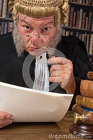 Judge with lorgnette Stock Photo