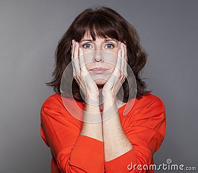 Judge mental concept for resigned beautiful 50s woman Stock Photo