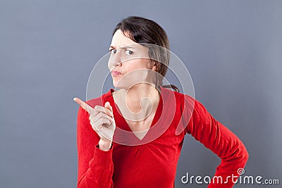 Judge mental woman expressing a severe watch out Stock Photo