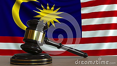 Judge`s gavel and block against the flag of Malaysia. Malaysian court conceptual 3D rendering Stock Photo