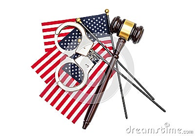 Judge`s gavel with handcuffs and american flag on white. American laws concept. Top view Stock Photo