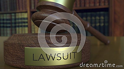 Judge`s gavel hitting the block with LAWSUIT inscription. 3D rendering Stock Photo