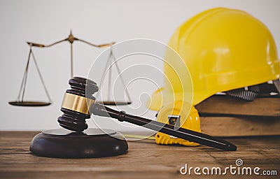 Judge's hammer and helmet Law and Justice about labor law concept Construction law Stock Photo