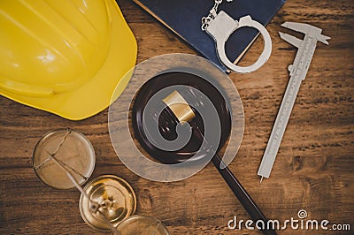 Judge's hammer and helmet Law and Justice about labor law concept Construction law Stock Photo