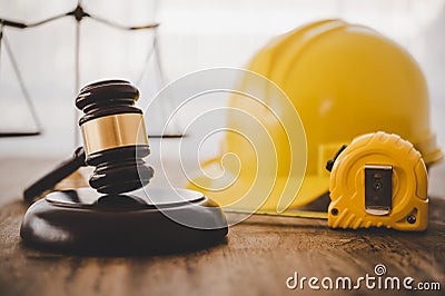 Judge's hammer and helmet Law and Justice about labor law concept Construction law Stock Photo