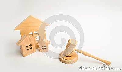 Judge`s hammer and wooden houses. Local government, self-government in a city or township. Decentralization, reservation. Adminis Stock Photo