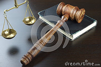 Judges Gavel, Old Book, Scale Of Justice On Black Table Stock Photo