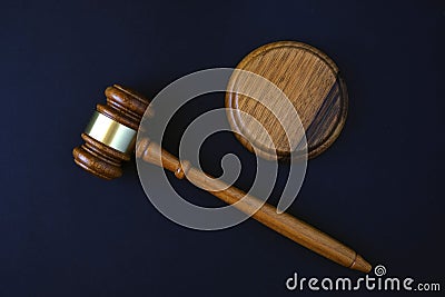 Judges wooden gavel on black background, justice concept Stock Photo