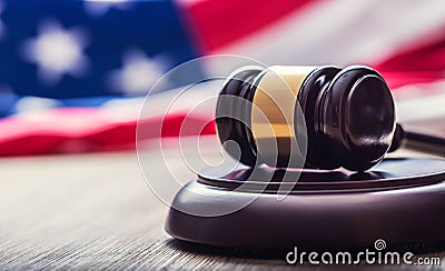 Judges wooden gavel with USA flag in the background. Symbol for jurisdiction Stock Photo