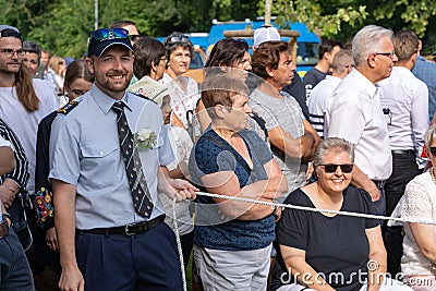 Fireman holding ropes for Jugendfest Brugg Impressionen Editorial Stock Photo