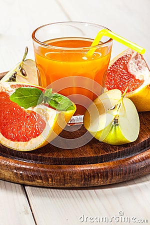 Juice of apples and red grapefruit. Stock Photo