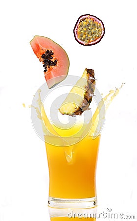 Juice splash with tropical fruits Stock Photo