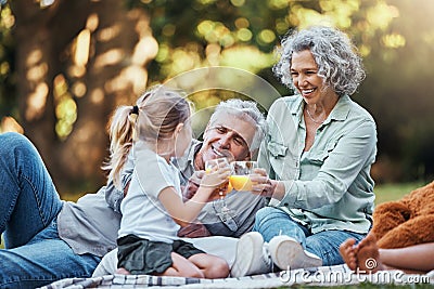 Juice, vitamin c and family picnic with child and grandparents for healthy growth development, outdoor wellness Stock Photo