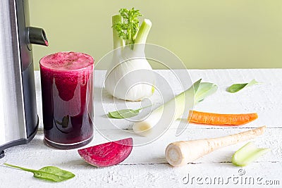 Juicer, red beetroot juice, other vegetables health diet detoxification Stock Photo