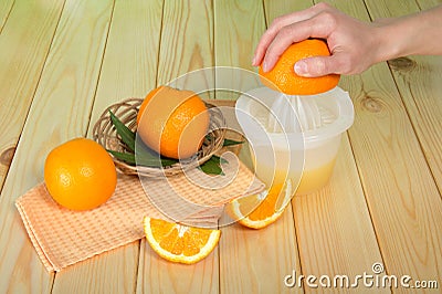Juicer, whole bright beautiful oranges Stock Photo