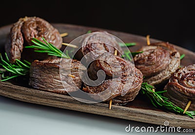 Juicy beef, fried and cooked in the shape of a rose, creatively served meat Stock Photo