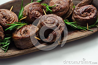 Juicy beef, fried and cooked in the shape of a rose, creatively served meat Stock Photo
