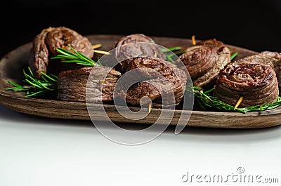 Juicy beef, fried and cooked in the shape of a rose, creatively served meat Stock Photo