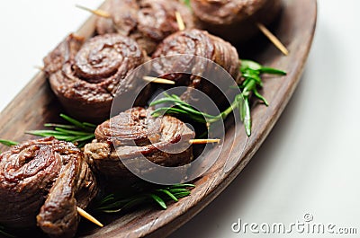 Juicy beef, fried and cooked in the shape of a rose, creatively served meat Stock Photo