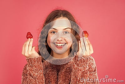 Juicy berry. Summer berries. Child eating strawberry. Happy child. Sucrose fructose glucose. Girl eating fresh natural Stock Photo