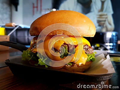 Juicy double meat burger with melting cheese Stock Photo