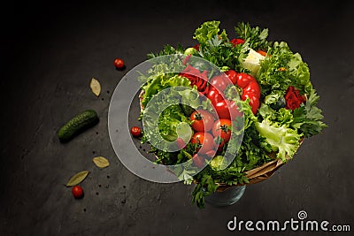 Juicy, fresh and colorful edible bouquet of vegetables on a black background Stock Photo