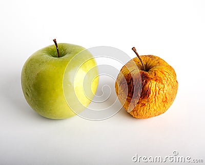 Juicy fresh and wizened dried apples Stock Photo