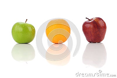 Juicy fruits of green apple, orange and red apple Stock Photo