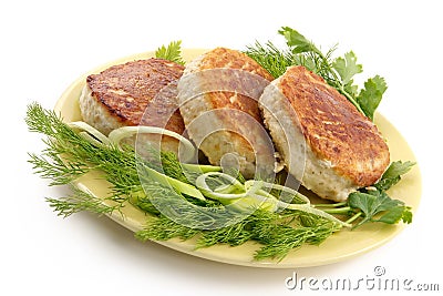 Juicy pork chops with a garnish from greens Stock Photo