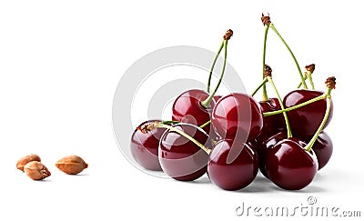 Juicy ripe cherries and cherrystones Stock Photo