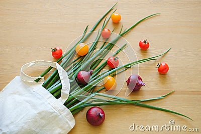 Juicy seasonal vegetables in a white eco bag Stock Photo