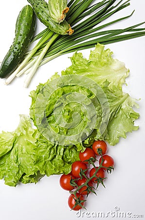 Tasty and fresh picked vegetables on white table. Diet food for healthy lifestyle Stock Photo