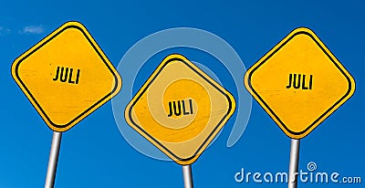 Juli - yellow signs with blue sky Stock Photo