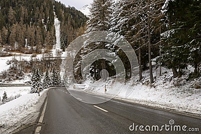 Julier pass road in winter near Rona, Switzerland Stock Photo