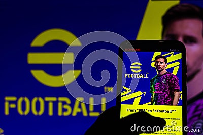 July 21, 2021, Brazil. In this photo illustration the eFootball logo game seen displayed on a smartphone. Konami reveals that Pro Cartoon Illustration