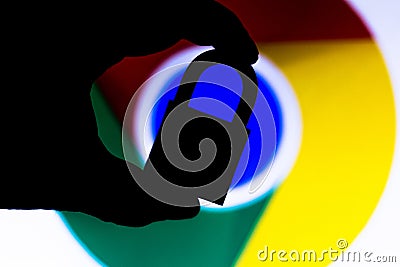 July 11, 2020, Brazil. In this photo illustration a padlock appears next to the Google Chrome logo. Online data protection/breach Cartoon Illustration