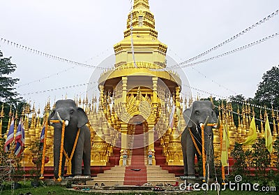 27 July 2018 - The Great Stupa 500 parts and a pair of elephants beside the entrance to the pagoda. Wat Pa Sawang Bun Editorial Stock Photo