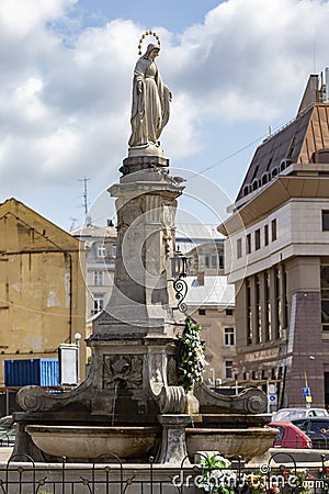 July 22, 2021 Lviv city Ukraine. Svobody Prospekt Lviv. Statue of the Blessed Virgin Mary on Liberty Avenue in Lviv Editorial Stock Photo