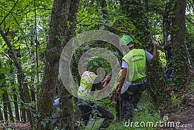 July 2021 Reggio Emilia, Italy: Alpinists, mountain climbers rescuers training in mountains Pietra di Bismantova. Soccorso alpino Editorial Stock Photo