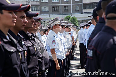 July 18 2019 Russia Magnitogorsk. A detachment of police officers on one of the city streets. A look from inside the line Editorial Stock Photo