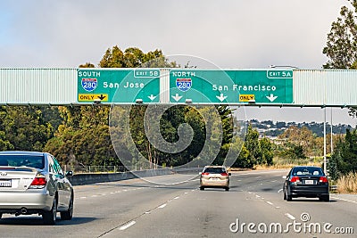 July 4, 2019 San Bruno / CA / USA - Travelling on the freeway in San Francisco bay area; signs signalling approaching interchange Editorial Stock Photo