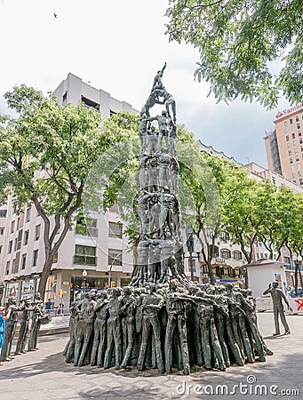 Statue of Castellers celebrate the colles castelleres on the Tarragona street Editorial Stock Photo