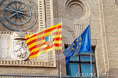 Aragon flag of Spain and Euro Union flag on the facade of government building Editorial Stock Photo